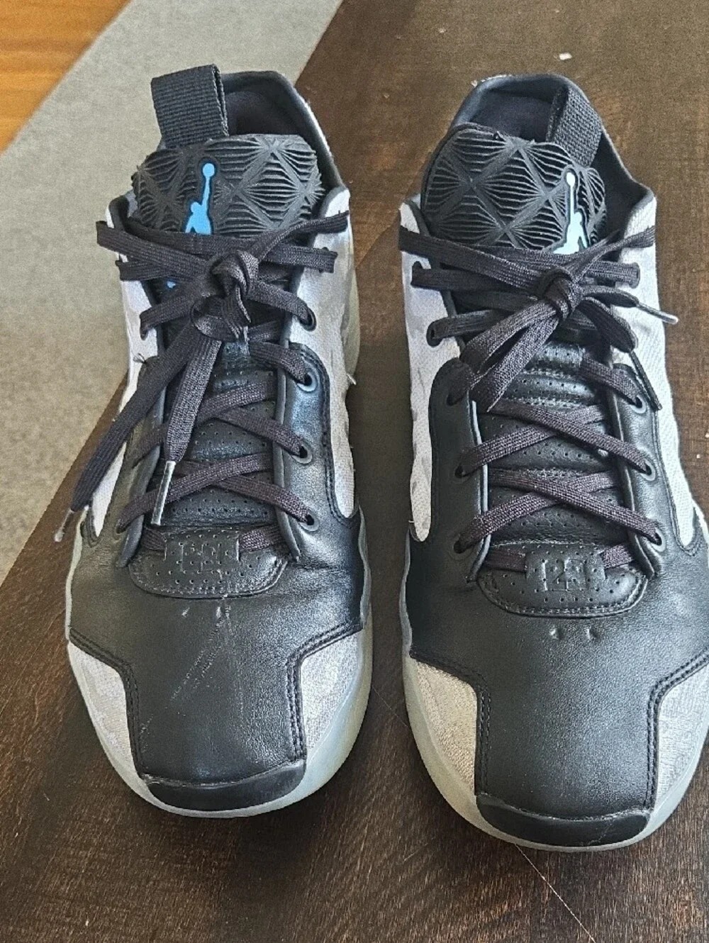 Jordan Mid/Low Black and Grey Athletic Sneakers with Blue Jumpman